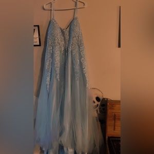 I’m selling a baby blue dress never been worn I just need it out of my closet